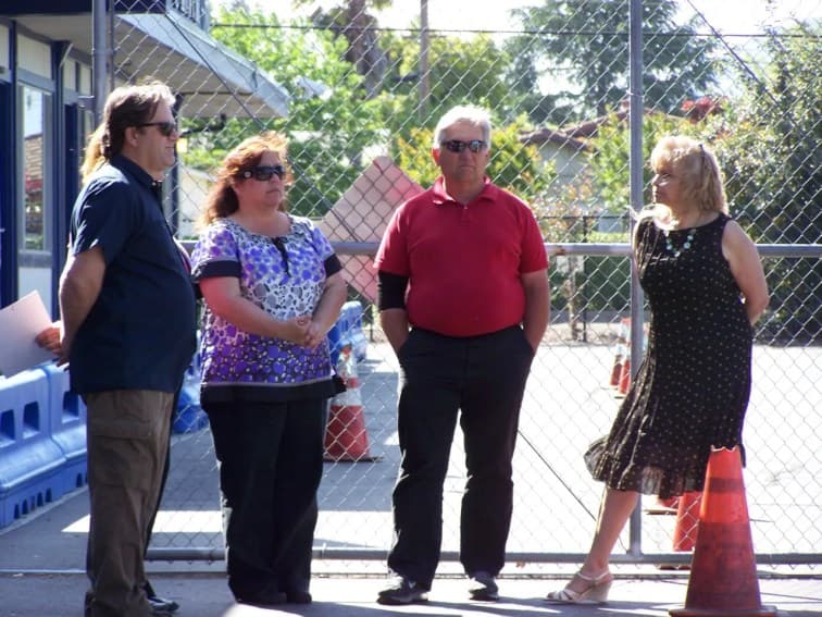Staff members in sunglasses