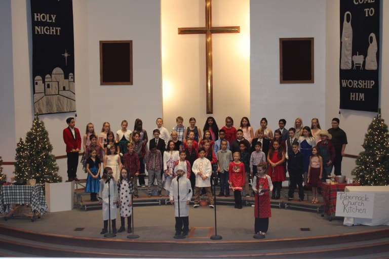 children singing at christmas performance