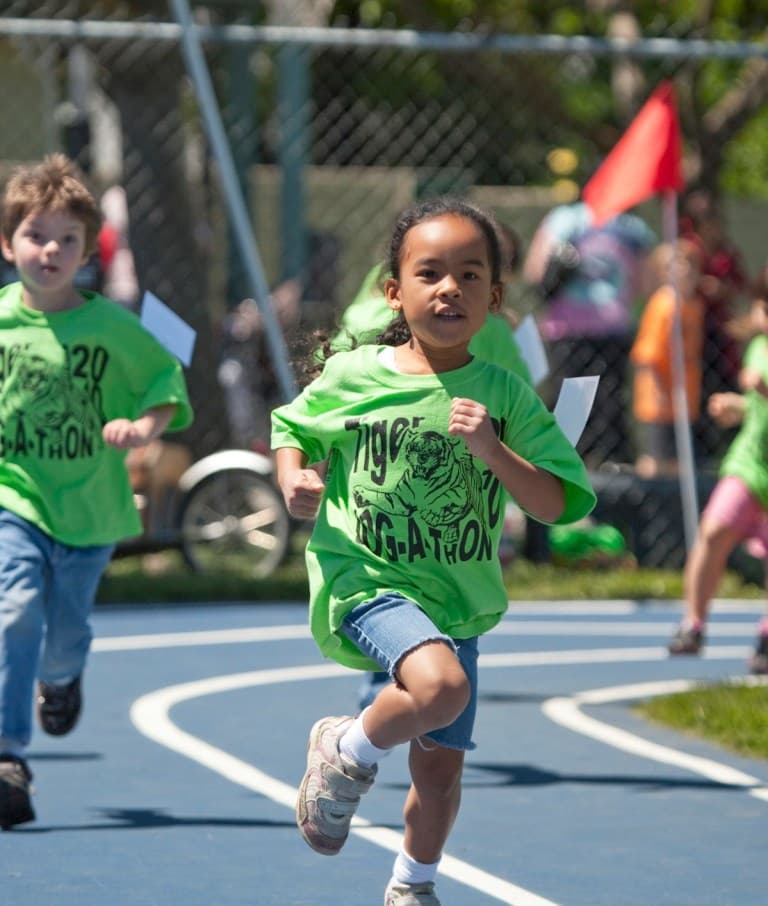 Child running on track